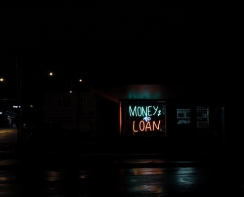A sign stating money to loan
