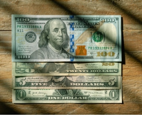 Closeup of several dollar notes