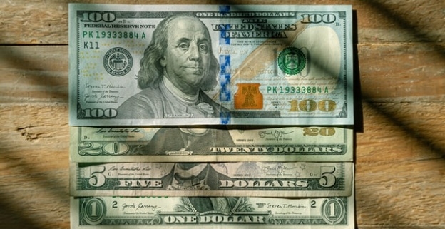 Closeup of several dollar notes