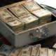Dollar notes in a suitcase