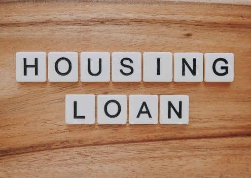 Housing Loan is written using scrabble game tiles