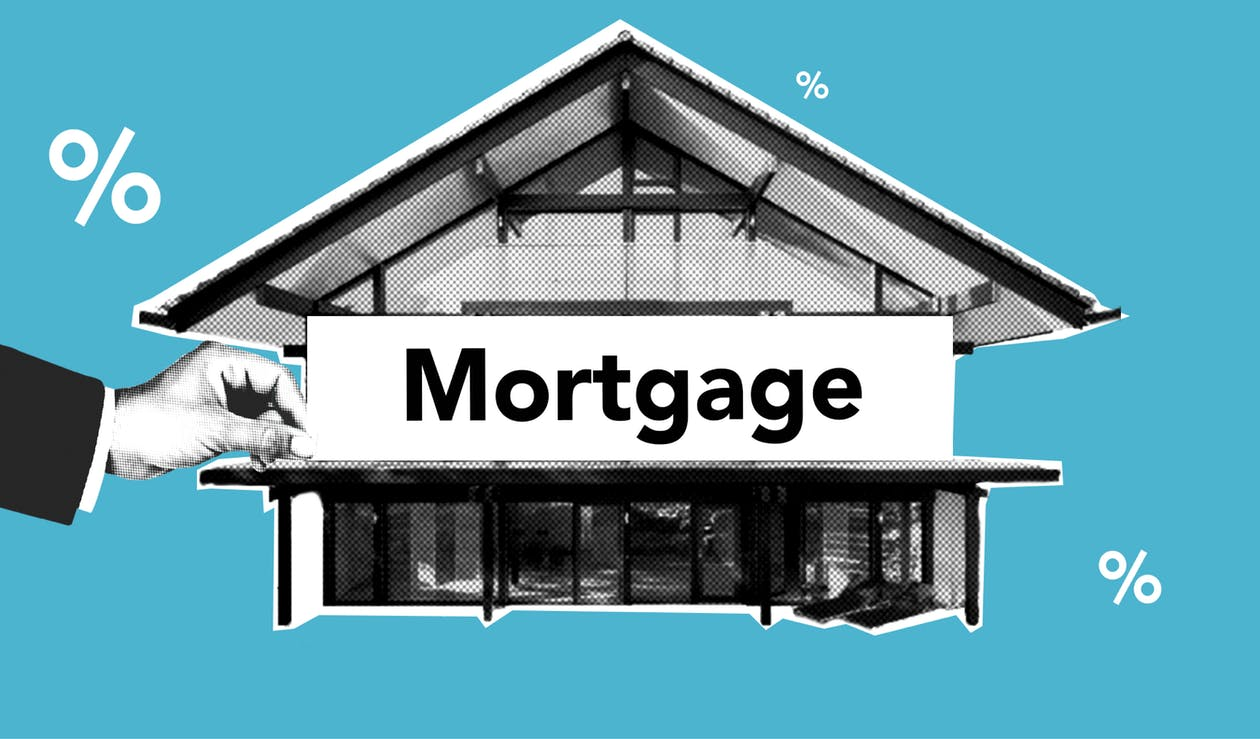 a building with a mortgage sign board