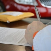 a man signing a loan agreement
