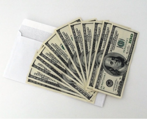dollar bills on a table